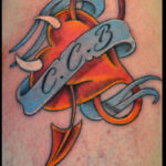 Petit tatouage de coeur diablotin réalisé à Aix-en-Provence