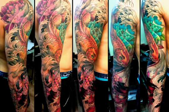 Tatouage japonais carpe sur le bras réalisé par un tatoueur à Aix-en-Provence