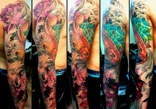 Tatouage japonais carpe sur le bras réalisé par un tatoueur à Aix-en-Provence