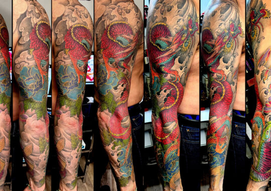 Tatouage japonais de dragon sur le bras par un tatoueur à Aix-en-Provence