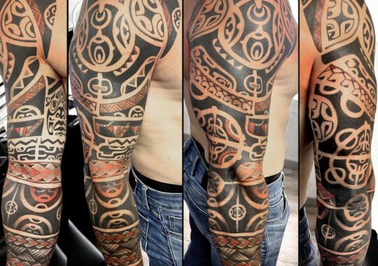 Tatouage maori polynésien sur le bras réalisé à Aix-en-Provence